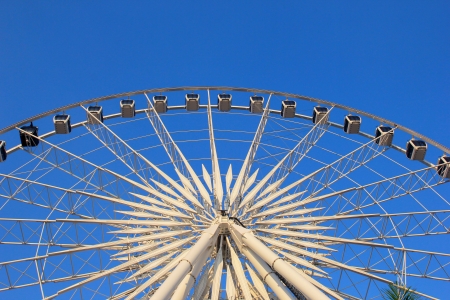 Ferris wheel with clear blue skyの写真素材