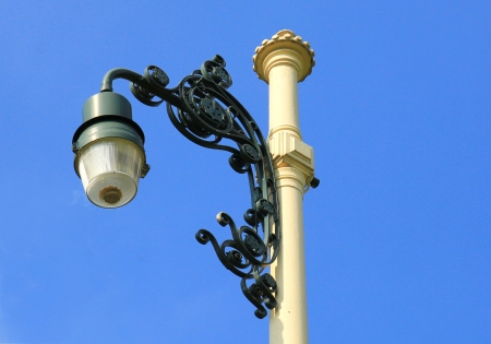 Retro street lamp-post on blue skyの写真素材