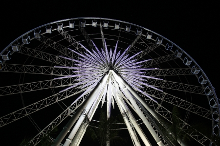 Ferris wheel by night with white lightの写真素材
