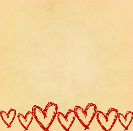 Handwriting heart shape on old paperの写真素材