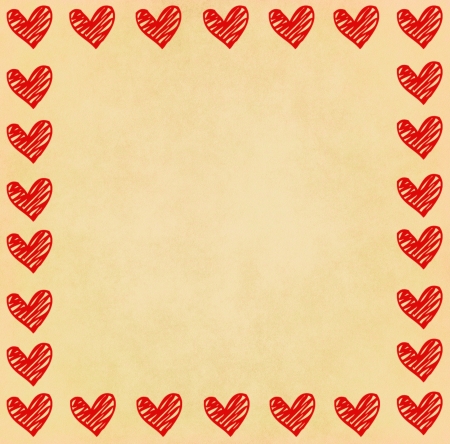 Handwriting heart frame on old paperの写真素材