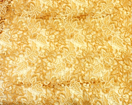 Detail of gold lace pattern fabric の写真素材