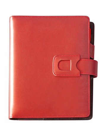 Leather red cover notebook isolated on white backgroundの写真素材