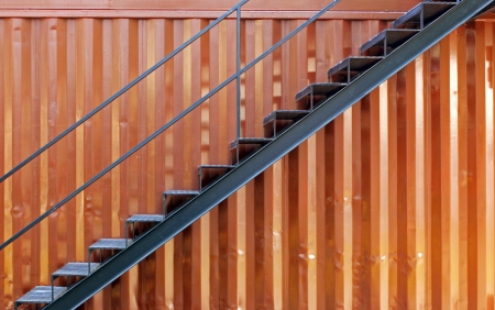 Steel stairs with cargo containerの写真素材