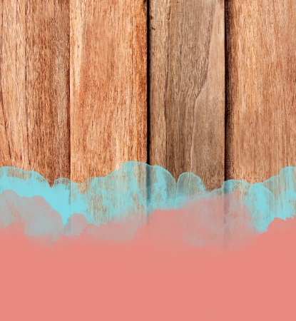 Blue and red stroke of the paint brush on wooden background の写真素材