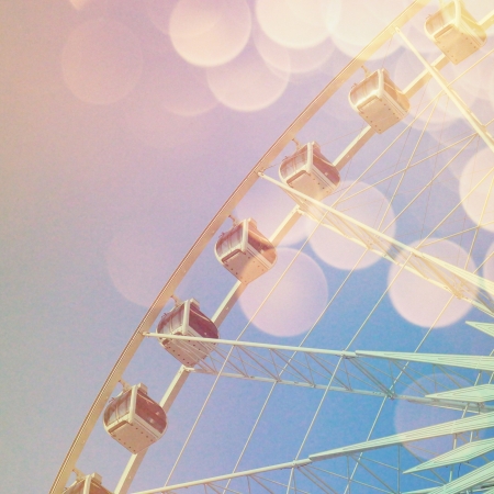 Ferris wheel and bokeh light with retro image styleの素材