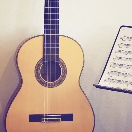 Guitar classic with stand note, retro filter effectの写真素材