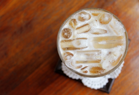 Iced coffee on wooden tableの写真素材