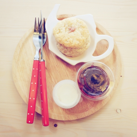 Homemade scone with strawberry jamの写真素材