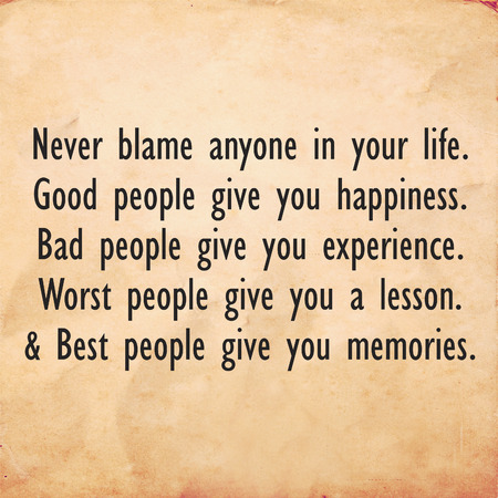 Inspirational motivating quote on old paper backgroundの写真素材