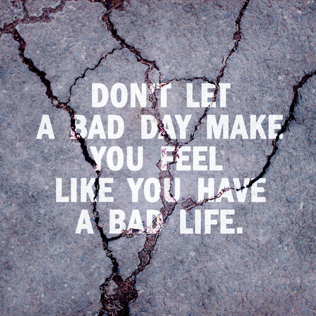 Inspirational motivating quote on cracked cement road の写真素材