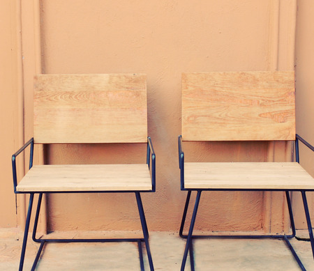 Outdoor wooden chairs with retro filter effectの写真素材