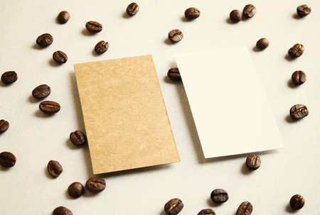 Blank business name card on coffee beans with retro filter effectの写真素材