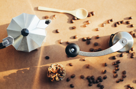 Coffee maker and grinder with coffee beans, retro filter effectの写真素材