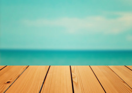 Empty wooden deck table over sea background Summer conceptの写真素材