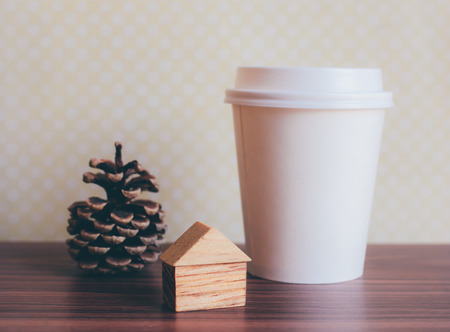 Ornament craft and coffee paper cup with retro filter effectの写真素材