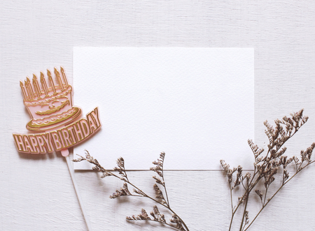 Happy birthday tag and blank postcard with flowerの写真素材
