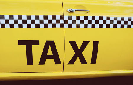 The side of New York City yellow taxi cabの写真素材