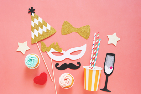 Cute party props, cakes on colorful background, happy new year party celebration and holiday conceptの写真素材