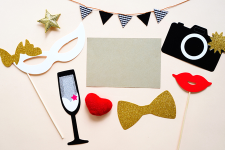 Cute party props and blank card on colorful background, happy new year party celebration and holiday conceptの写真素材