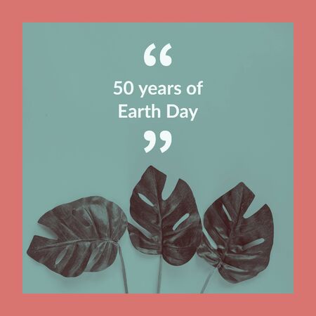 50 years of Earth Day message on green plant background, save the earth and eco friendly conceptの写真素材