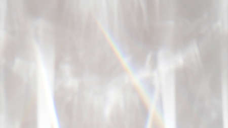 Abstract rainbow rays of light shadow overlay effect from sunlight on a white background, mockup and backdrop, minimal effect trendの写真素材