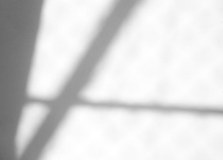 Window natural shadow overlay effect on white texture background, for overlay on product presentation, backdrop and mockupの写真素材