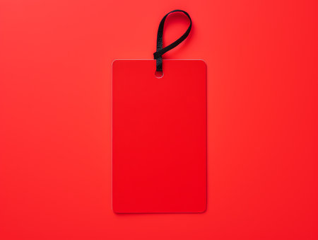 Blank empty price tag for sale promotion on red background, black friday conceptの素材