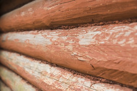 Wooden wall from logs as a background textureの写真素材