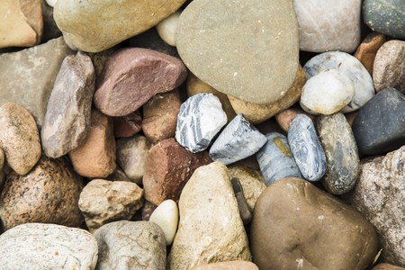 Abstract background with dry round reeble stonesの写真素材