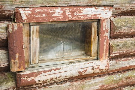 Detail of old window frame made from wood.