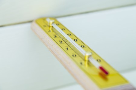 Closeup thermometer showing temperature in degrees Celsiusの写真素材