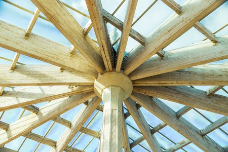 Wood trusses radiating from center of a wooden roofの写真素材