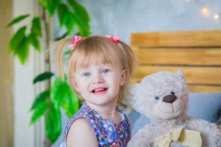 Portrait of funny little girl at home. Family, childhood and leisure conceptの写真素材