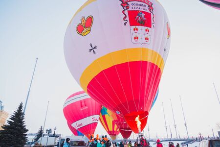 NIZHNY NOVGOROD, RUSSIA - FEBRUARY 24, 2018. Mass-start on the festival of hot air ballonsのeditorial素材