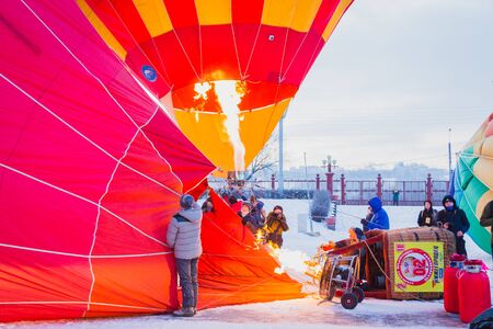 NIZHNY NOVGOROD, RUSSIA - FEBRUARY 24, 2018. Mass-start on the festival of hot air ballonsのeditorial素材