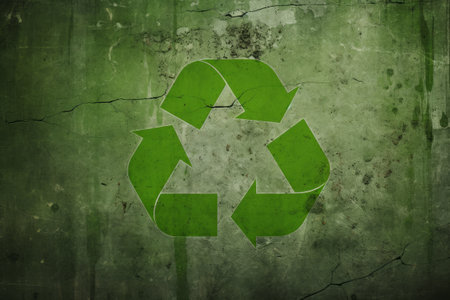 Recycling symbol in grunge style. Environmental protection, ecology, recycling conceptの素材