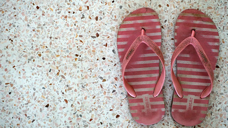 Pink shoes on the marble floor.の写真素材