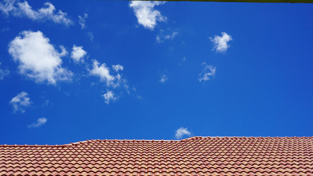 Tile roof under the blue sky