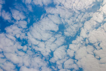 Blue sky with clouds backgroundの写真素材