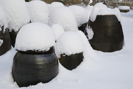 White snow accumulated on the crockの写真素材