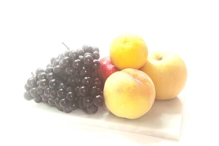 Still life, korean delicious and fresh fruit, apple, pear, peach, tangerine, grape, autumn, chuseokの写真素材