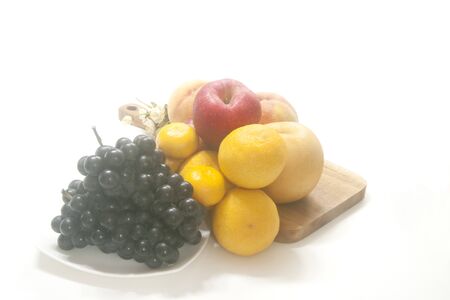 Still life, korean delicious and fresh fruit, apple, pear, peach, tangerine, grape, autumn, chuseokの写真素材