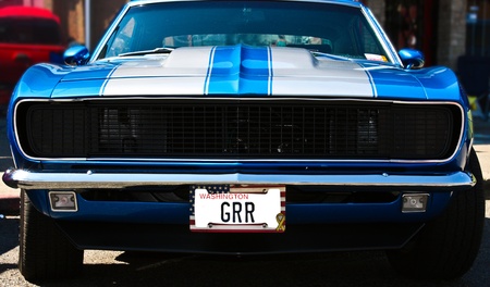 Vintage blue muscle car featuring an aggressive license plateのeditorial素材