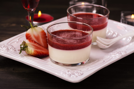 Romantic eveneng with delicious italian panna cotta dessertの写真素材