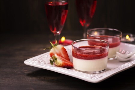 Romantic eveneng with delicious italian panna cotta dessertの写真素材
