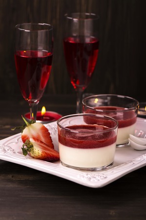 Romantic eveneng with delicious italian panna cotta dessertの写真素材