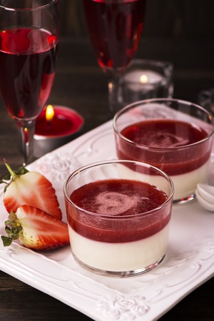 Romantic eveneng with delicious italian panna cotta dessertの写真素材