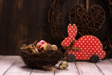 Easter rabbit and nest with eggs. Toned image. Selective focusの写真素材