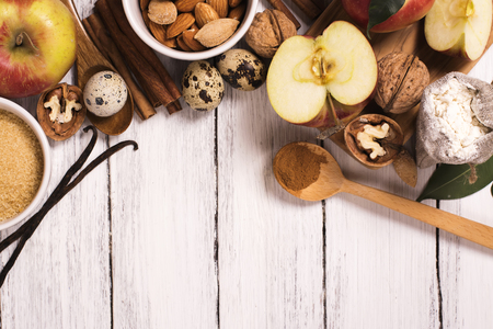 Apple pie ingrediens over white wooden background. Baking concept backgroundの写真素材